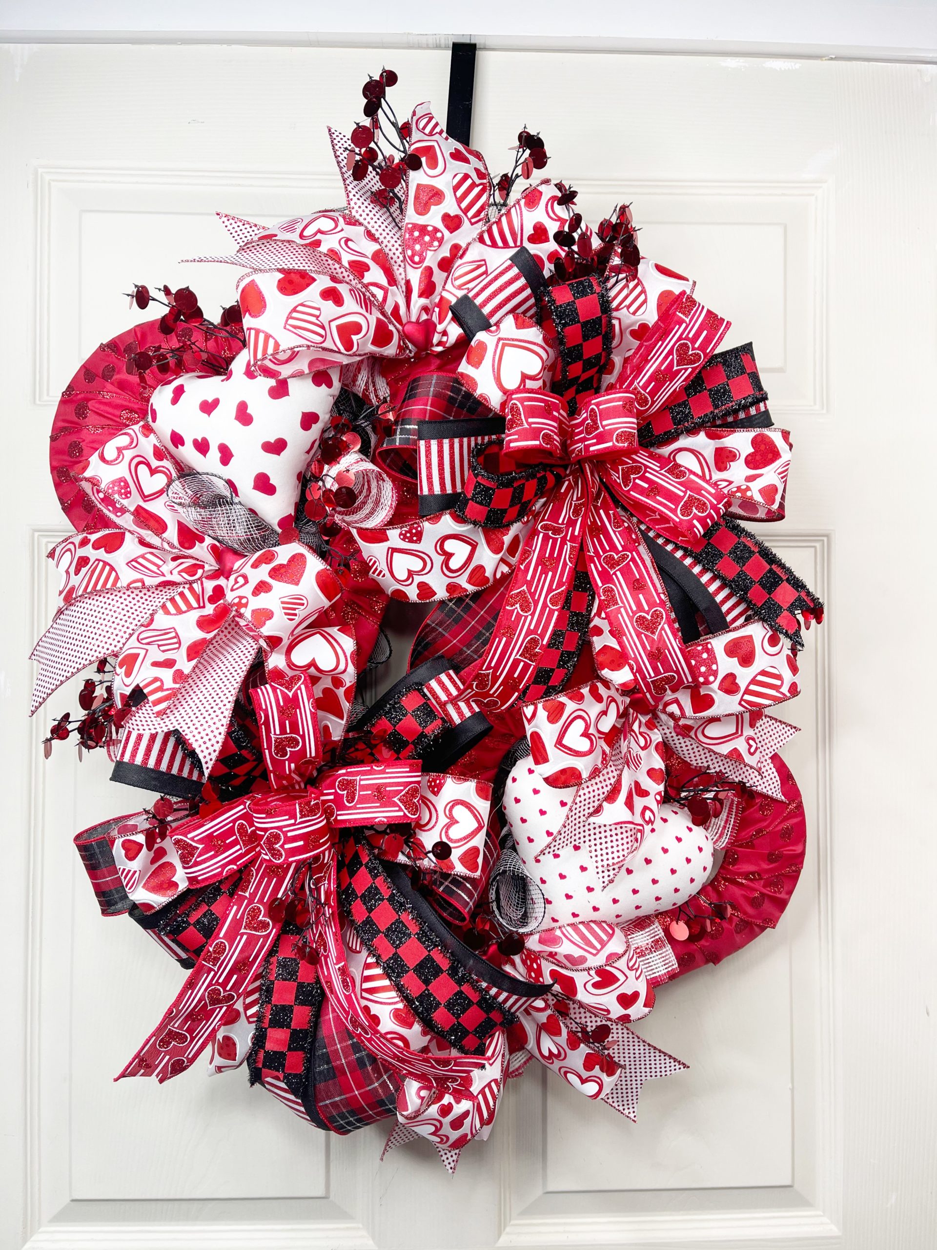 valentine's day wreath with bows and hearts