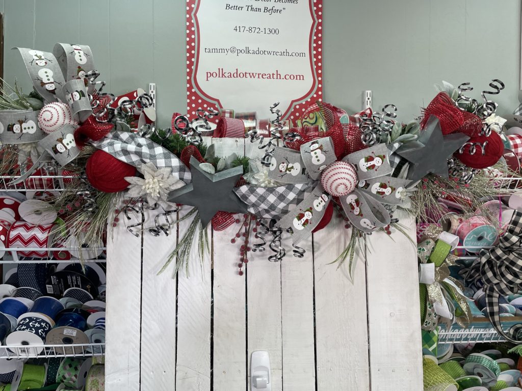 Christmas garland on a white pallet