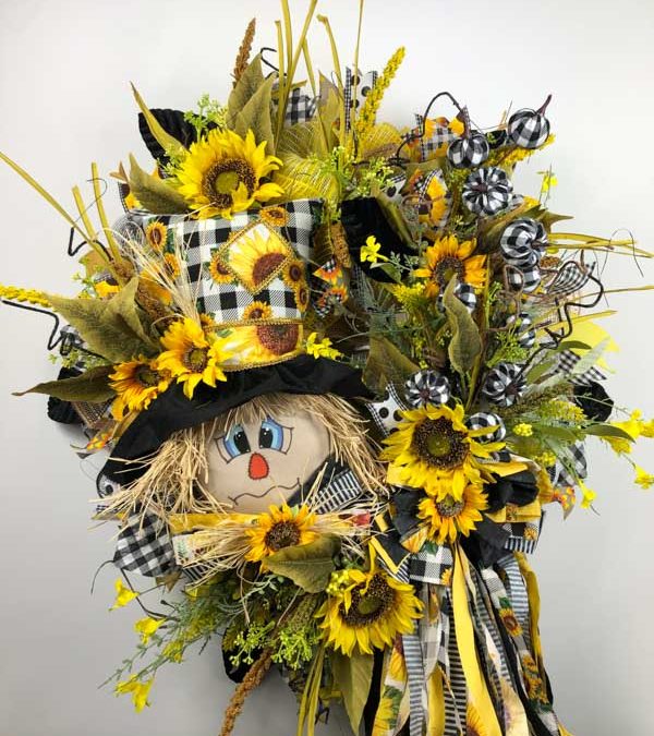 7.8.21 Scarecrow with rag bow (at warehouse with Coach Jordan) – Coach Mel