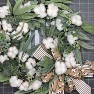wreath with cotton, greenery, and bow