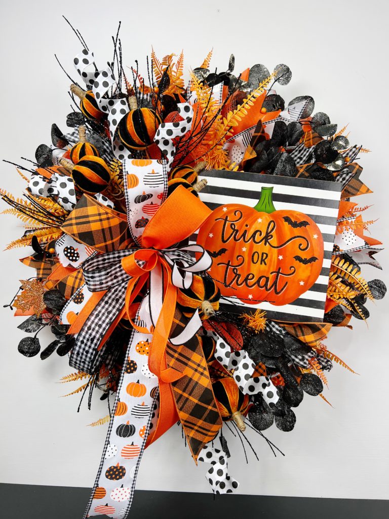 halloween wreath with trick or treat sign