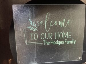 customized cutting board with vinyl words welcome to our home The Hodges Family
