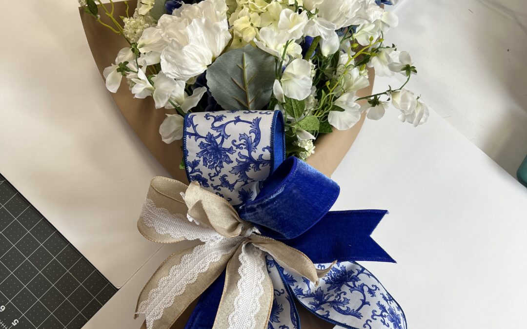 Blue and White Floral Bouquet – Coach Jordan – REPLAY