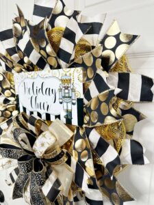 Close up of sign on New Year's Eve wreath