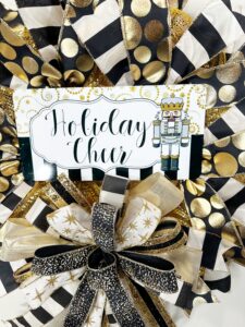 Close up of sign on New Year's Eve wreath